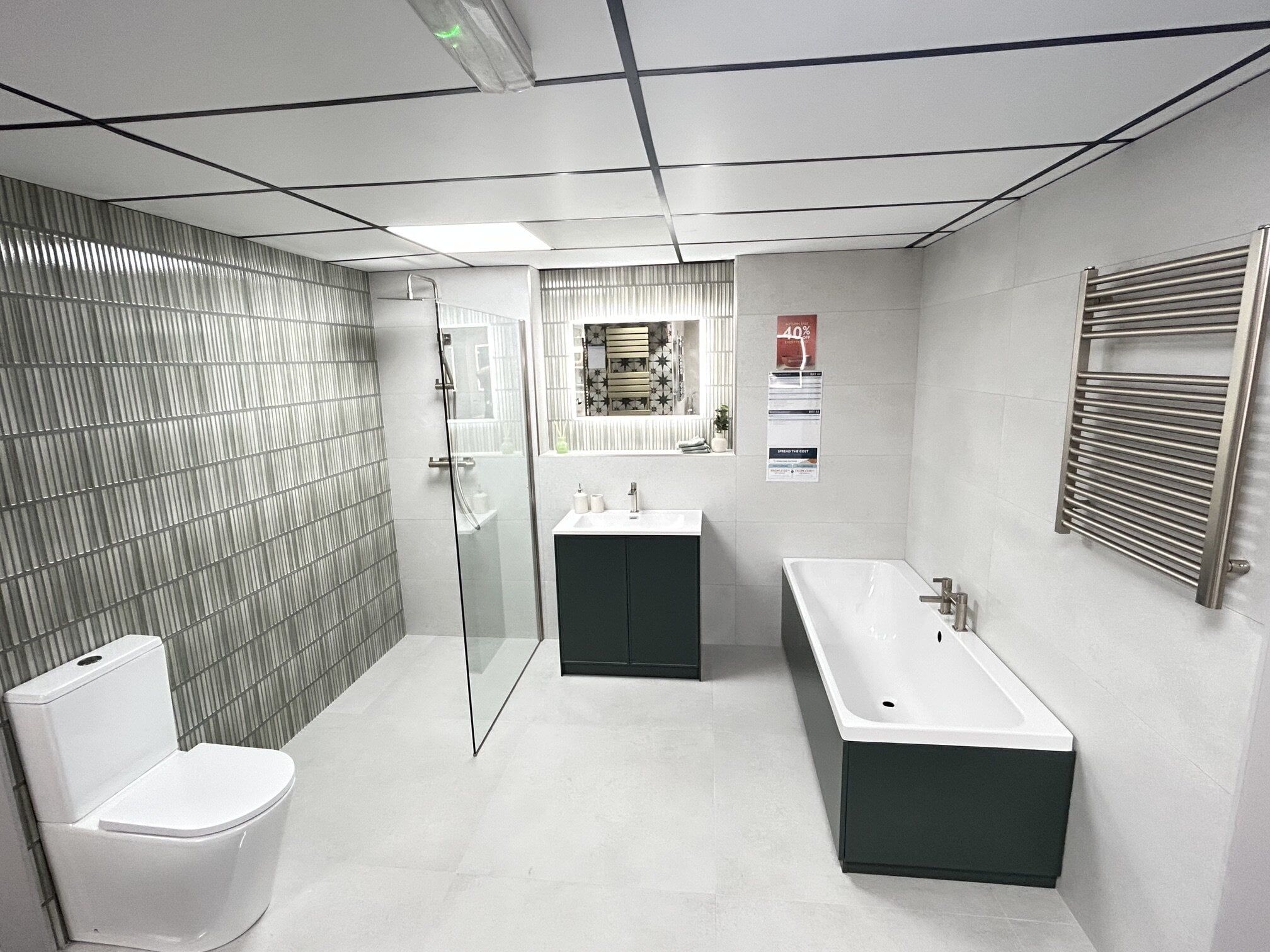 Green medusa tiles in walk in shower bathroom display