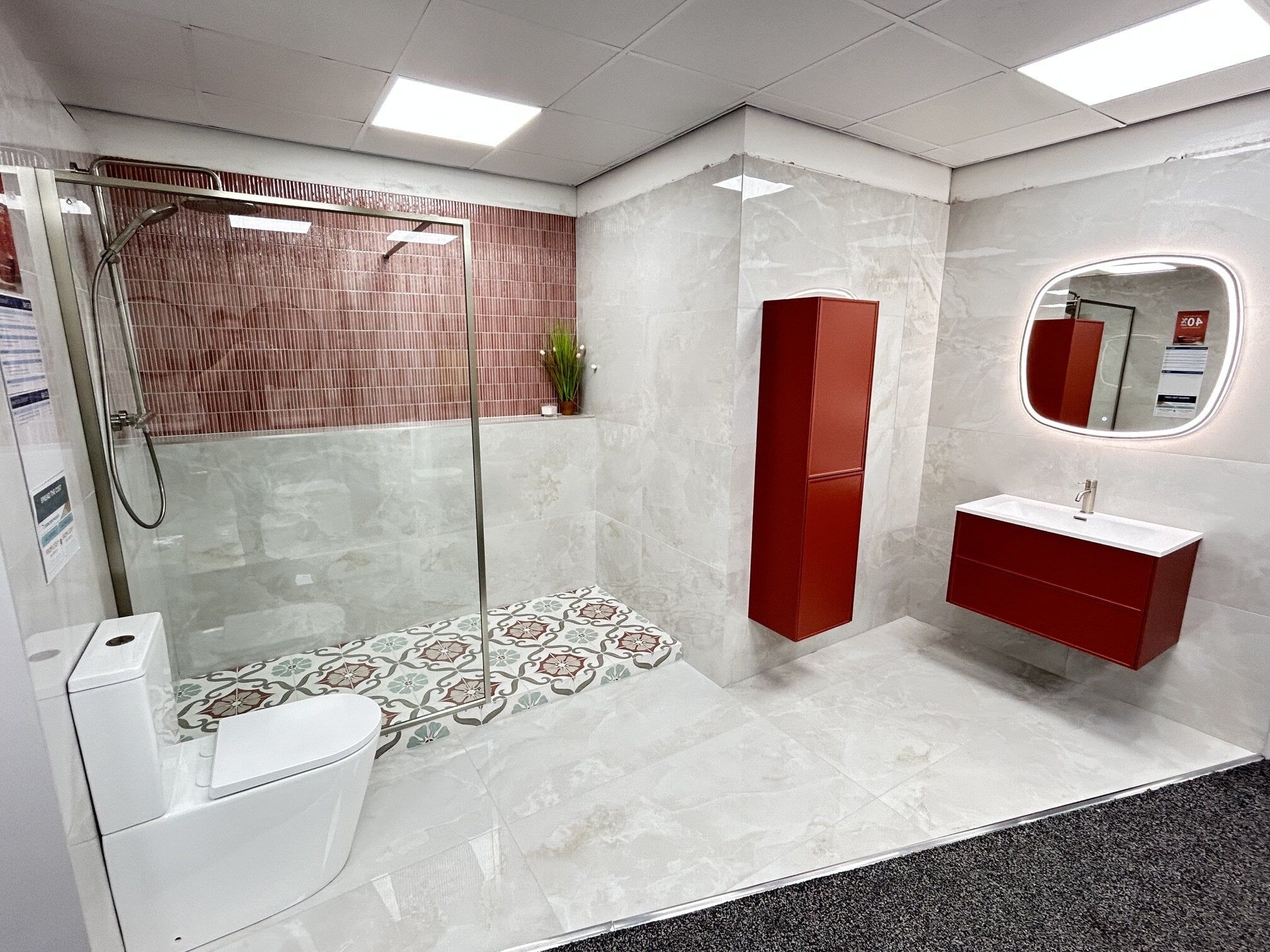 glitter onyx marble tiles and pink bathroom furniture and feature tiles