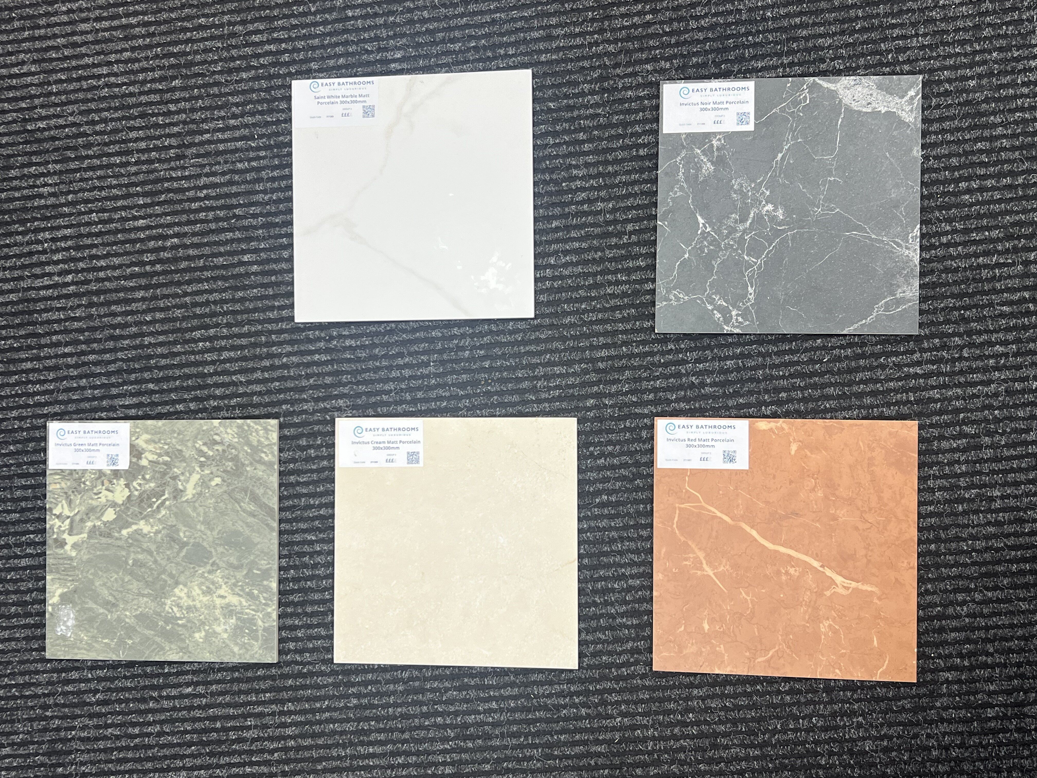 Showroom tile display featuring marble tile swatches