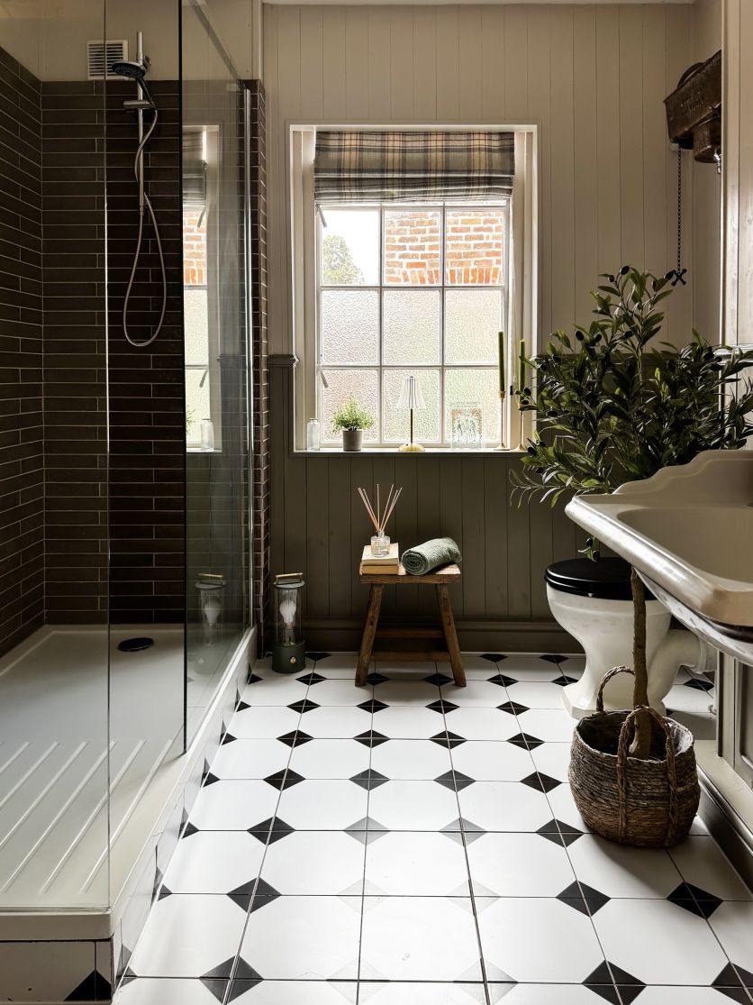 Chesterton Victorian chequered ceramic tiles in a traditional bathroom with walk-in shower