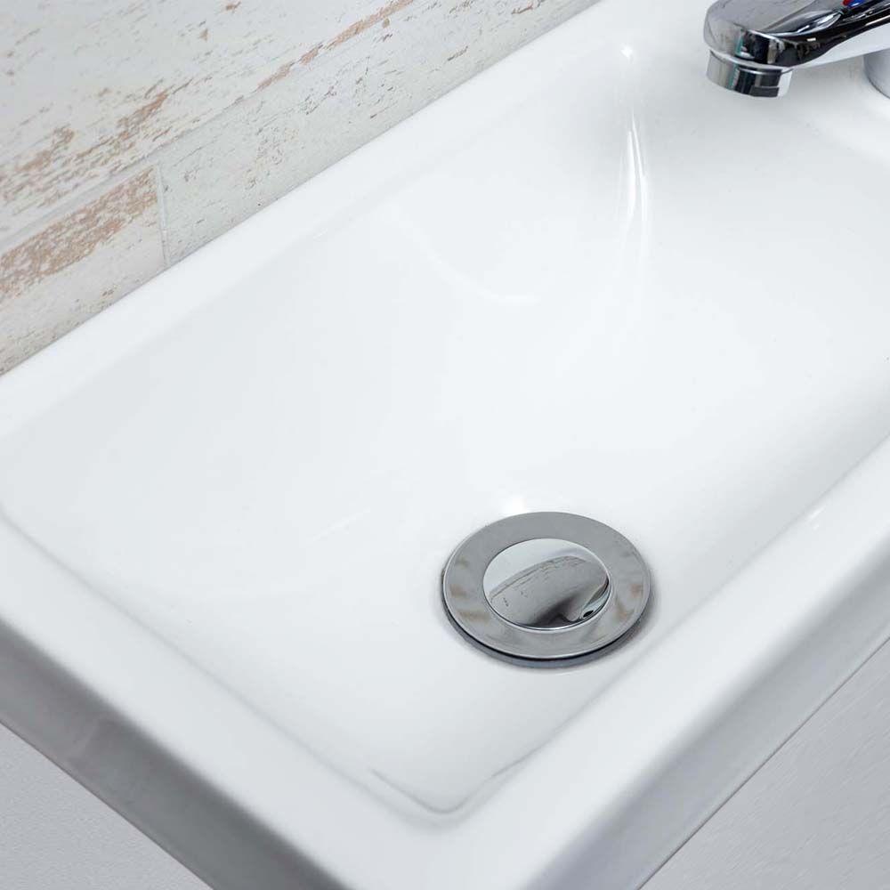 Detailed view of the ceramic basin for the Nante Gloss White Floor Standing Cloakroom Vanity Unit