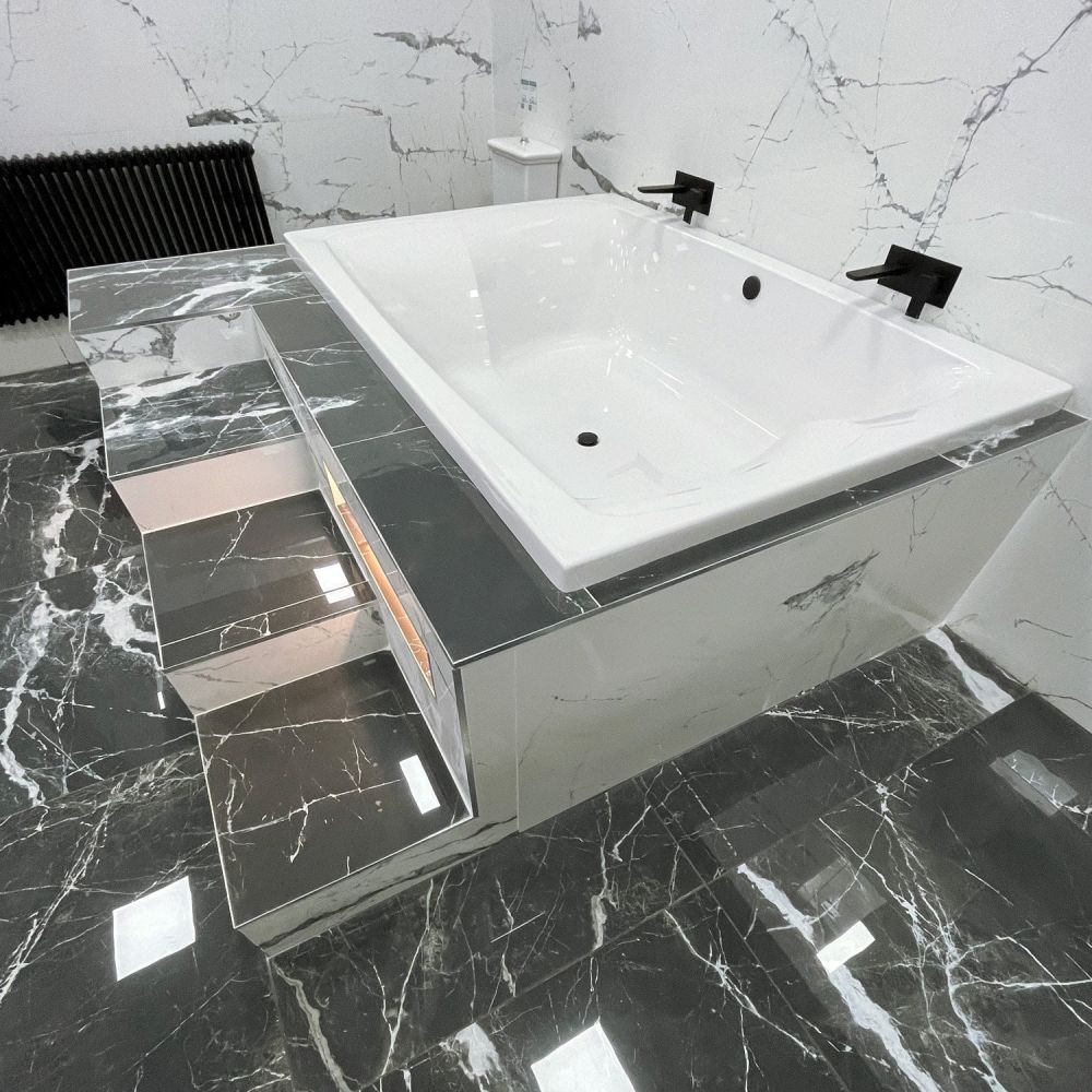 Contemporary bathroom setting showcasing the Carron Celsius Duo Double Ended Carronite Bath 2000x1400mm