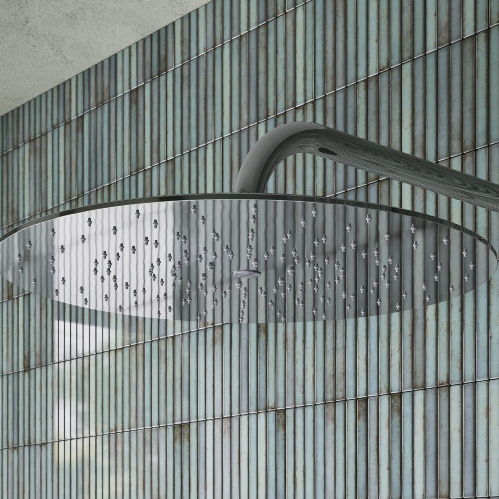 Aqualisa S3 Chrome Wall Fixed Shower Head detailed view upon a teal tiled background