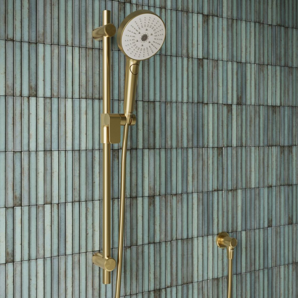 Aqualisa S3 Gold Slide Rail Kit detailed view upon a teal tiled background