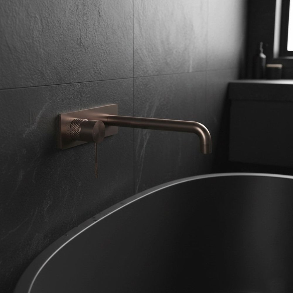 Moray Satin Bronze single lever bath mixer tap featuring a textured knurled detailing - Roomset