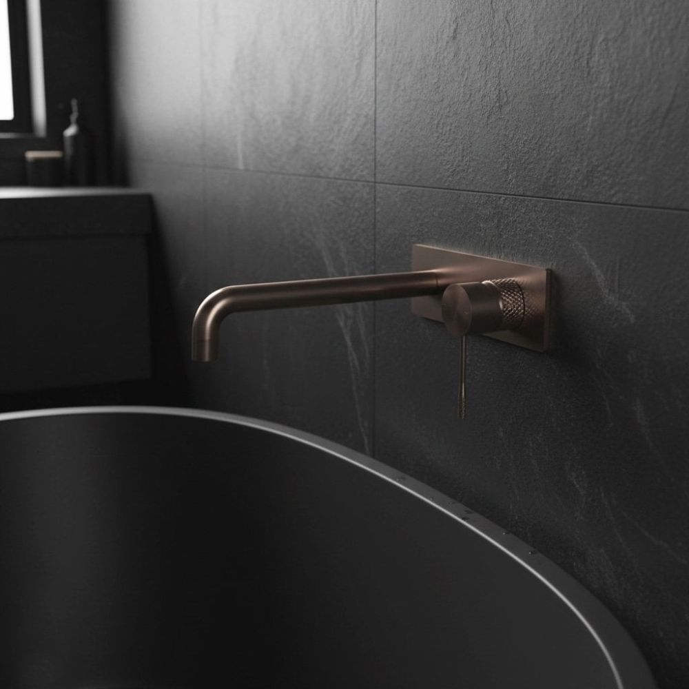Moray Satin Bronze single lever bath mixer tap featuring a textured knurled detailing - Roomset