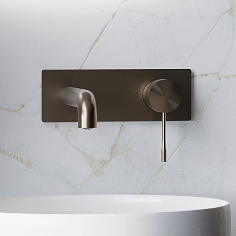 Moray Satin Bronze wall mounted basin tap featuring a textured knurled detailing - Roomset