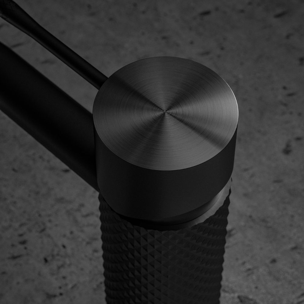 Moray Gunmetal single lever basin mixer tap featuring a textured knurled detailing - Close up of the tap head