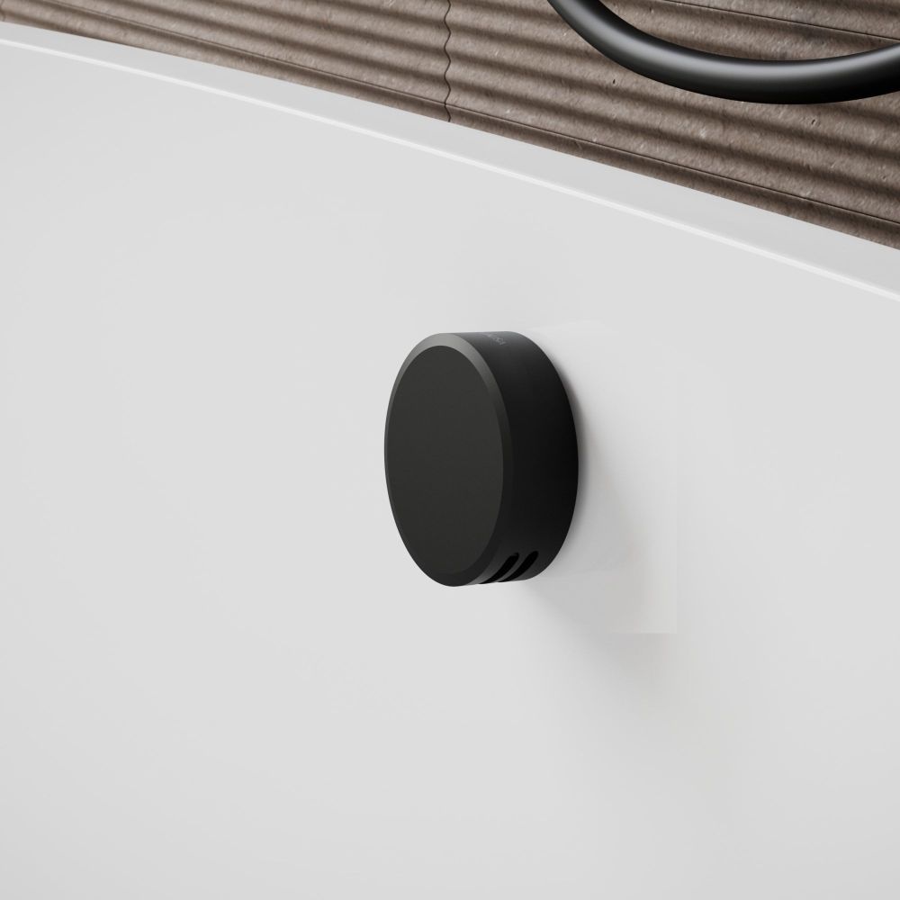 Aqualisa S3 black bath filler with brown tiled background