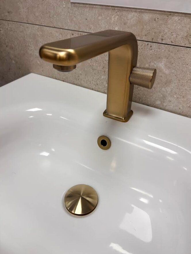 Close up of Manisa champagne gold basin mono tap at Easy Bathrooms Bedford