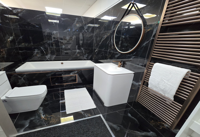 Easy Bathrooms & Tiles Showroom Newbury display stand featuring a modern bathroom suite in black tones