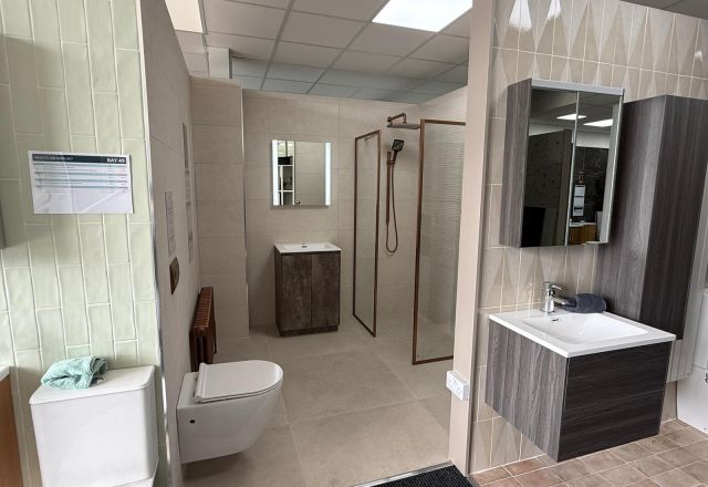 Walk-in shower and bathroom furniture display at Lewisham