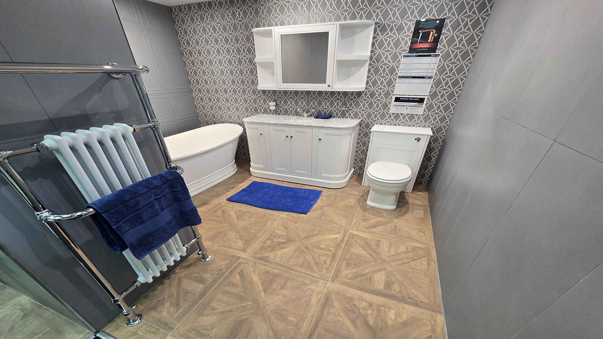 Easy Bathrooms & Tiles Showroom Newbury display stand featuring a modern bathroom suite