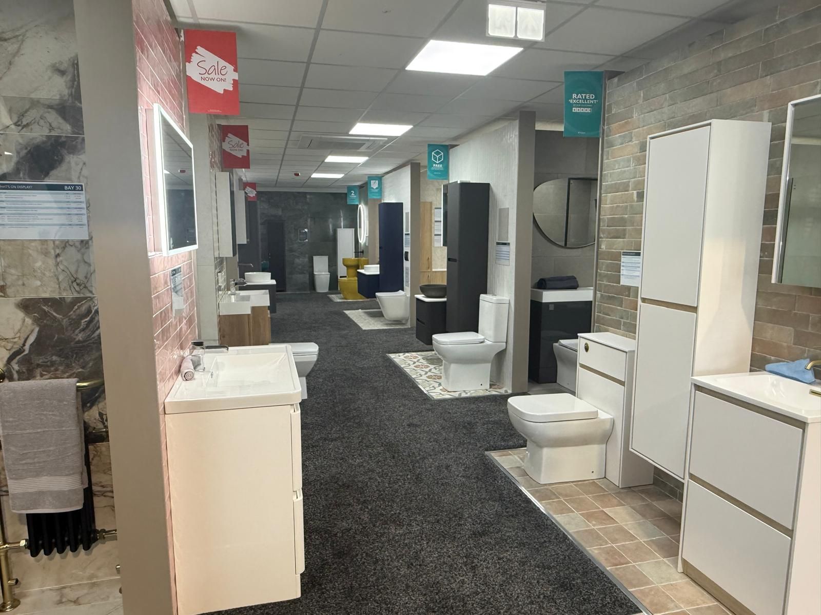 Easy Bathrooms Cirencester corridor featuring selection of bathroom furniture